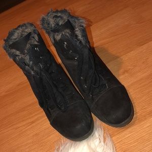 Black bootie wedges with fur at top.
